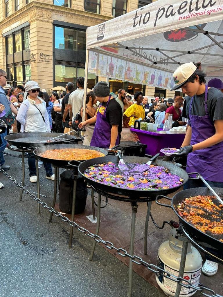 Street vendor cooking traditional paella at Union Square, NYC. Photography by Wanda Jones-Lopez.